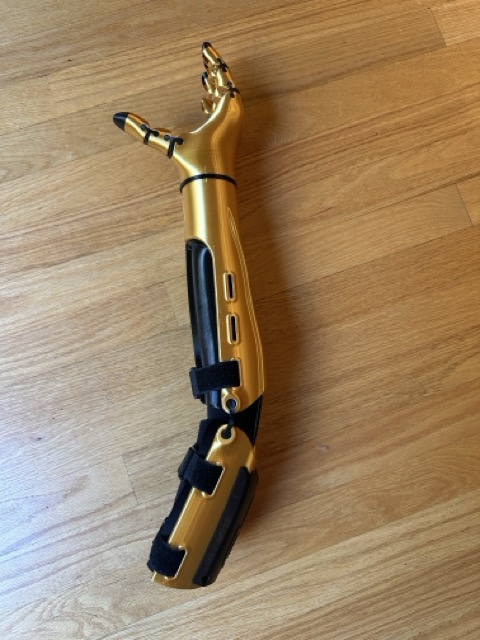 Kinetic Arm, diagonal view, strap and buckle detail
