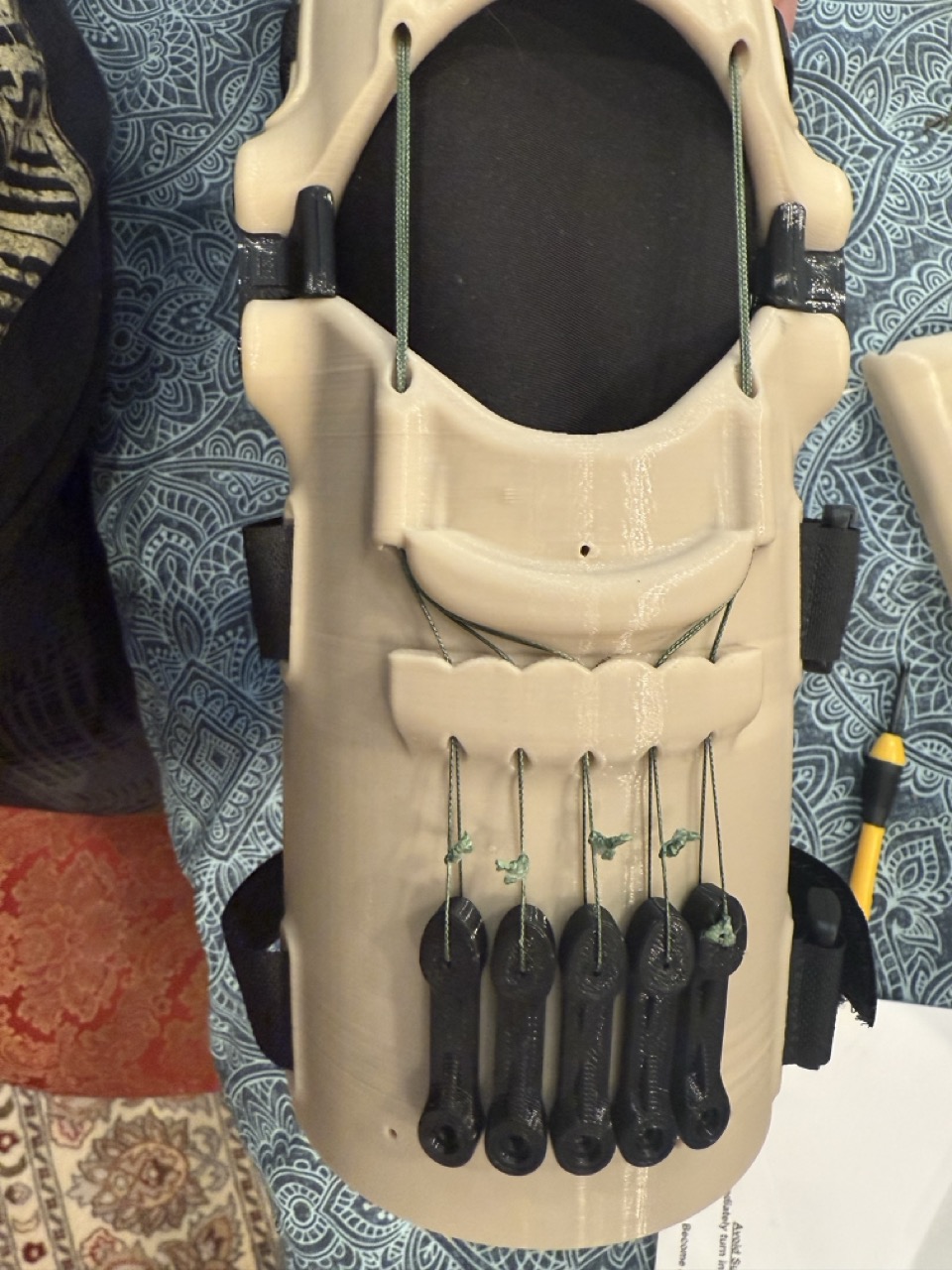 Interior of the socket, five tensioner cords and wrist mechanism exposed