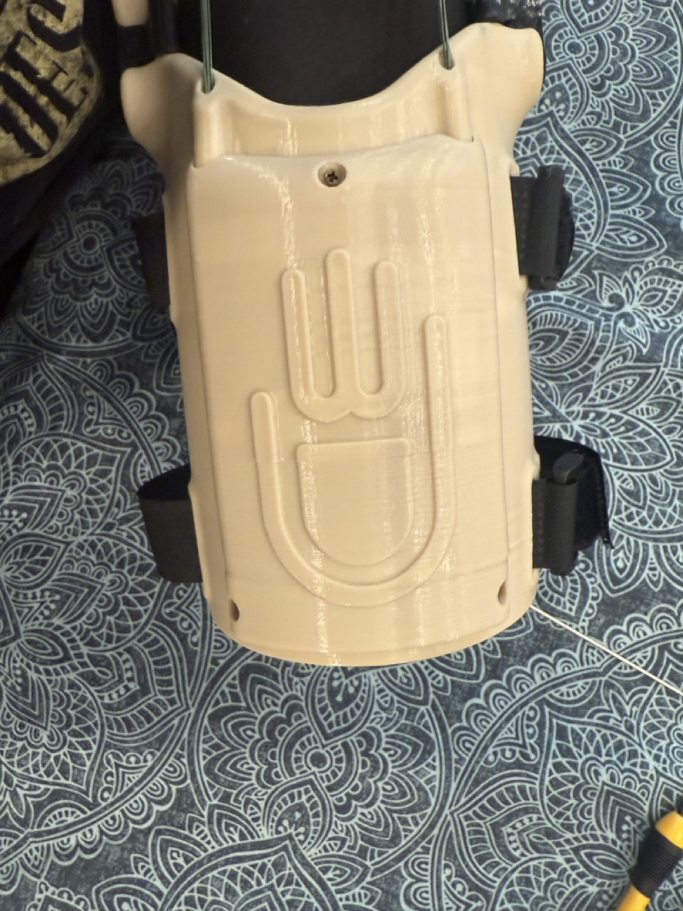 Back of the forearm shell, e-NABLE hand symbol embossed