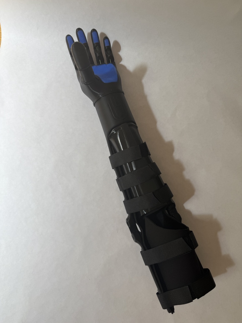 Kinetic Arm Left on white background, one of two arms built for the Uganda campaign